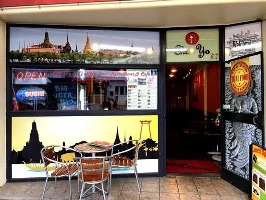 The Chai-Yo Café storefront on Queen Street with the open sign lit